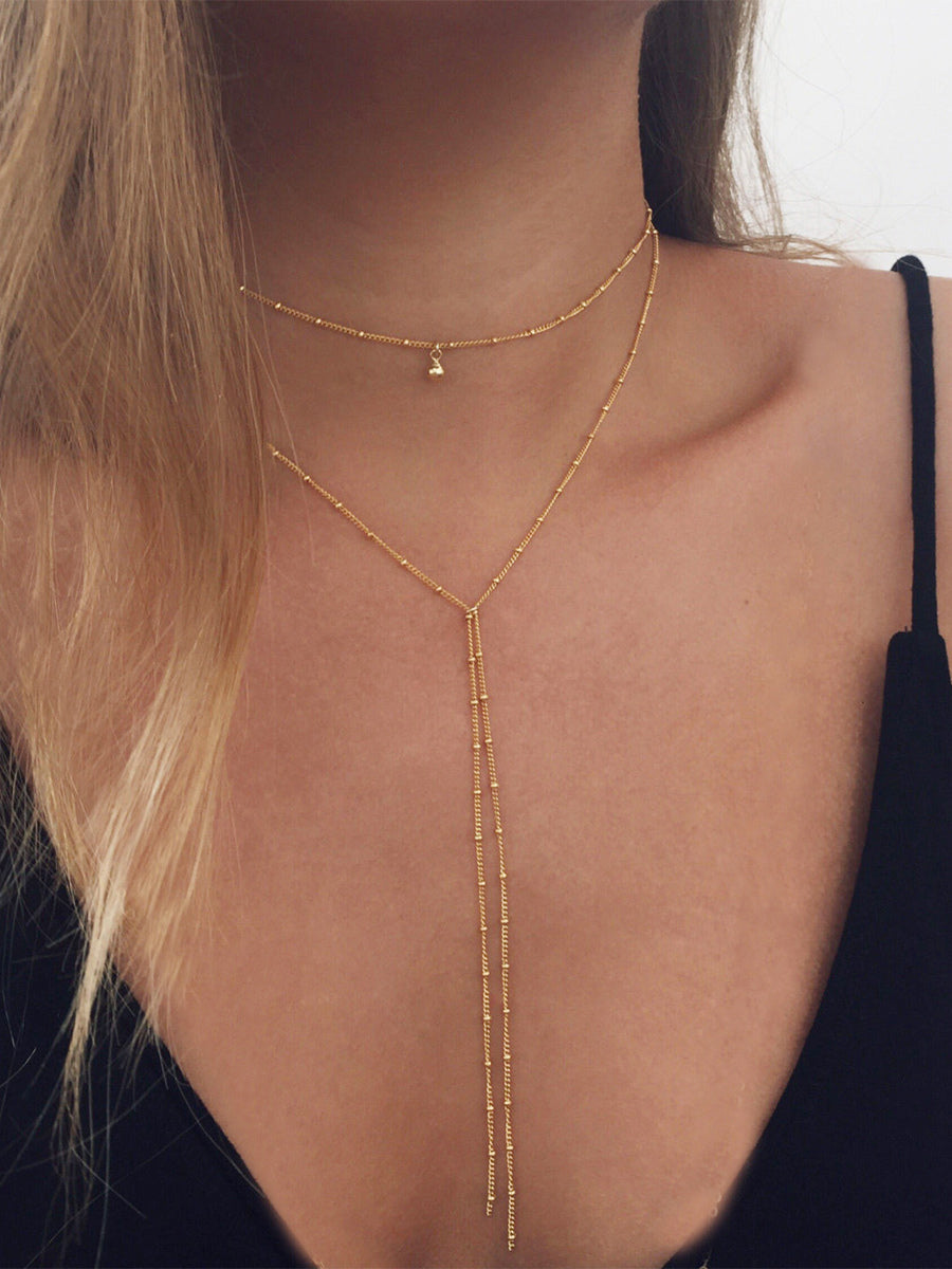 gold necklace — view 1
