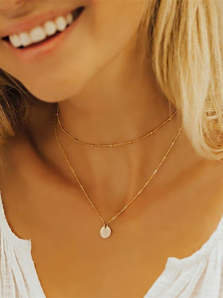 gold beaded necklace — view 2