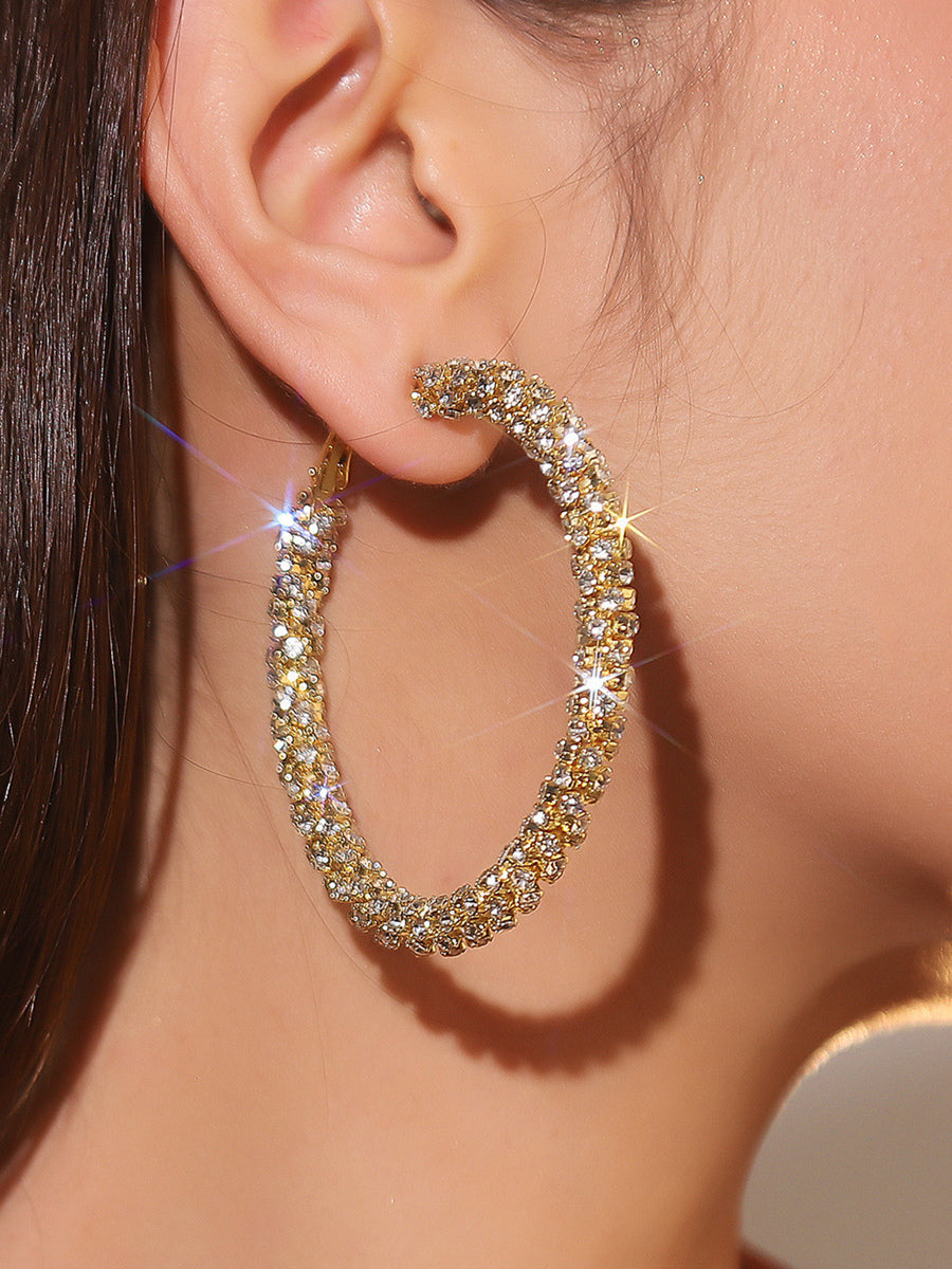gold embellished earrings — view 1