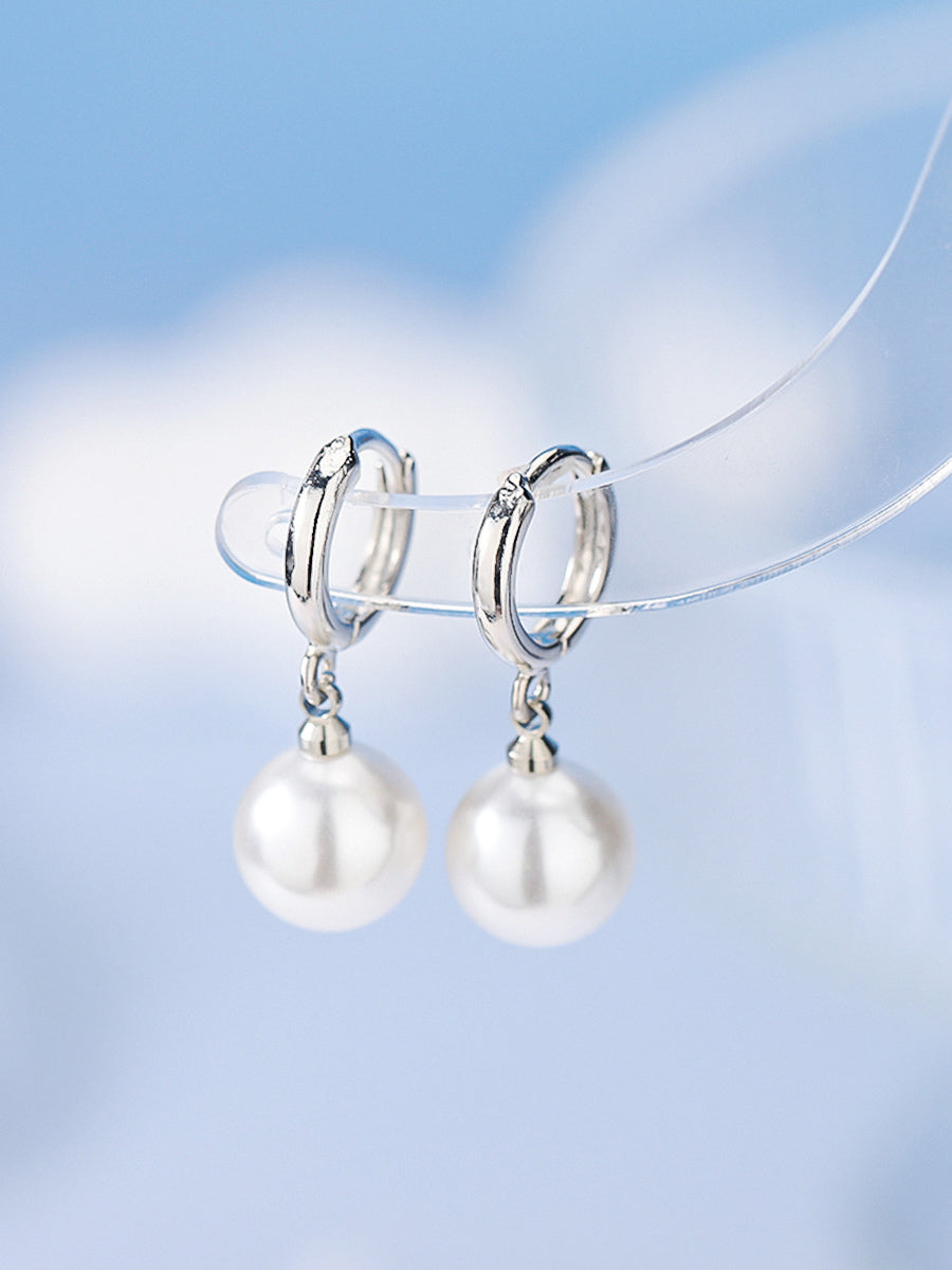 gold earrings — view 3