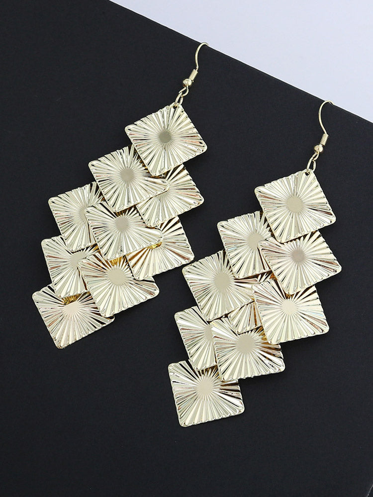 gold earrings — view 1