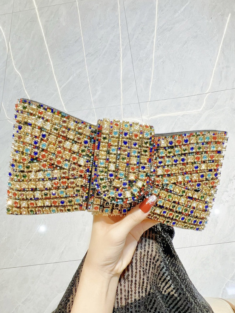 gold embellished relaxed bow detail handbag — view 1