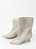 Ivory Pointed-Toe Kitten Heel Cut-Out Ankle Boots — view 1