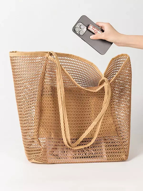 brown handbag — view 4
